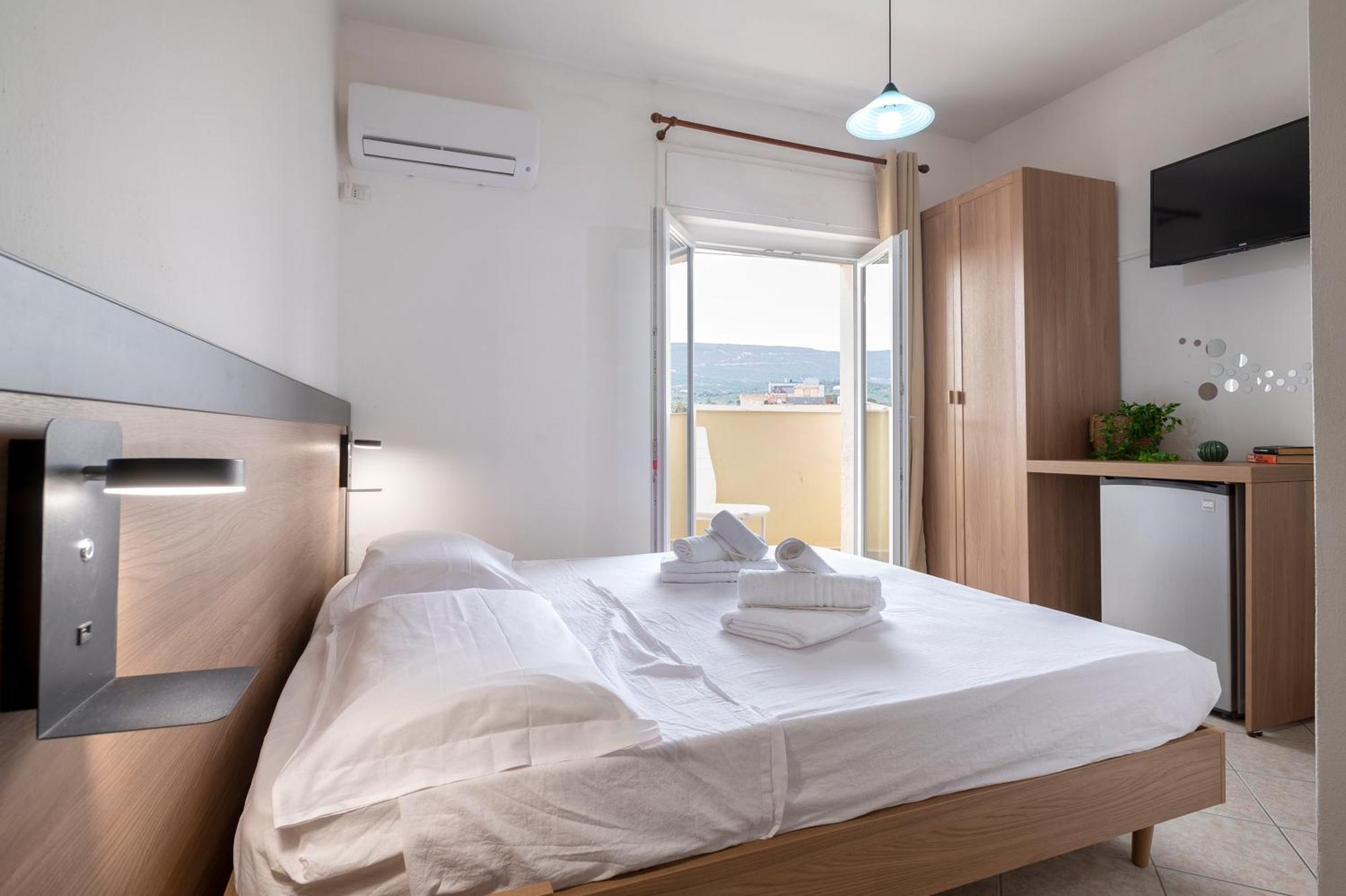 Oasis Guest House Альгеро Экстерьер фото