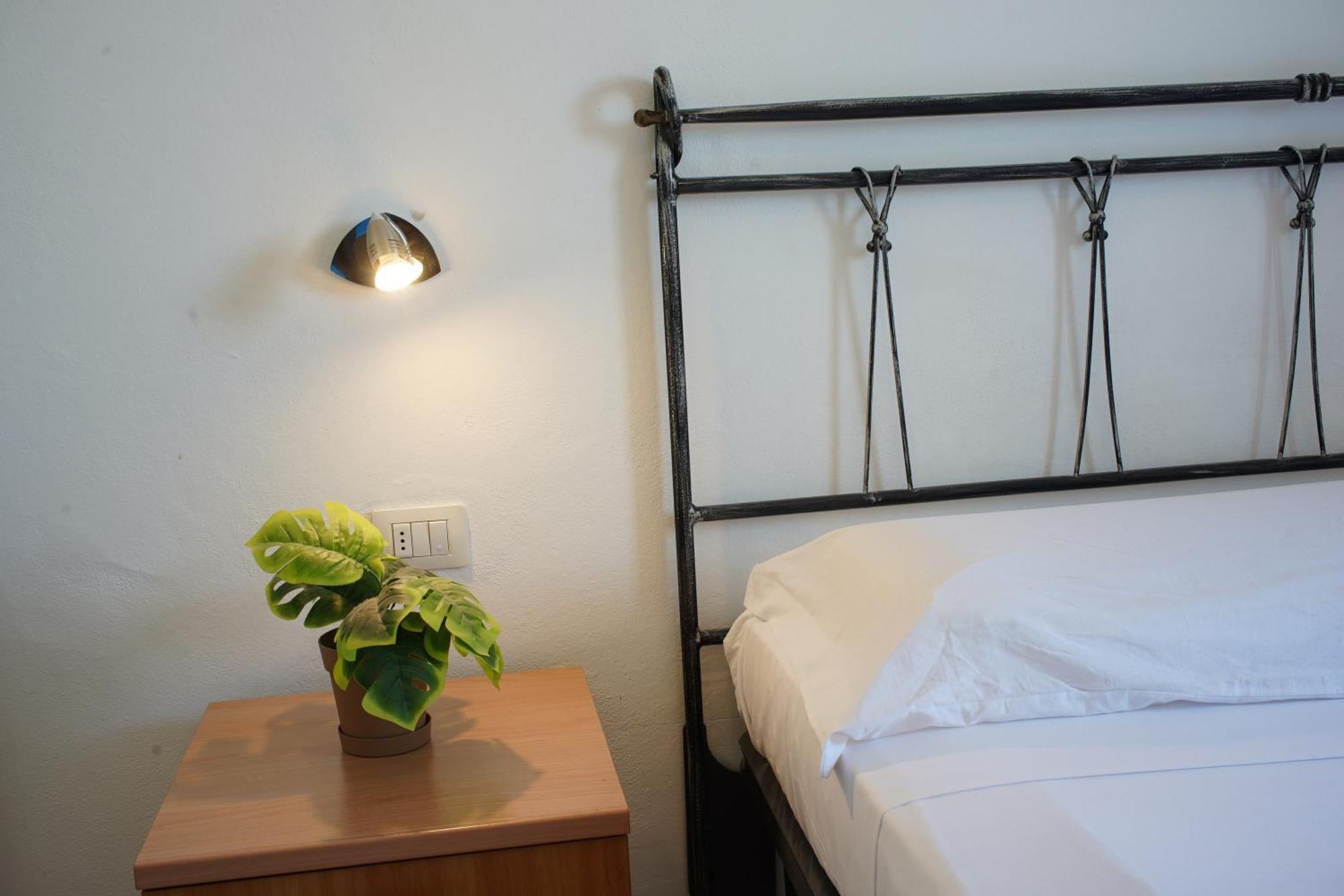 Oasis Guest House Альгеро Экстерьер фото